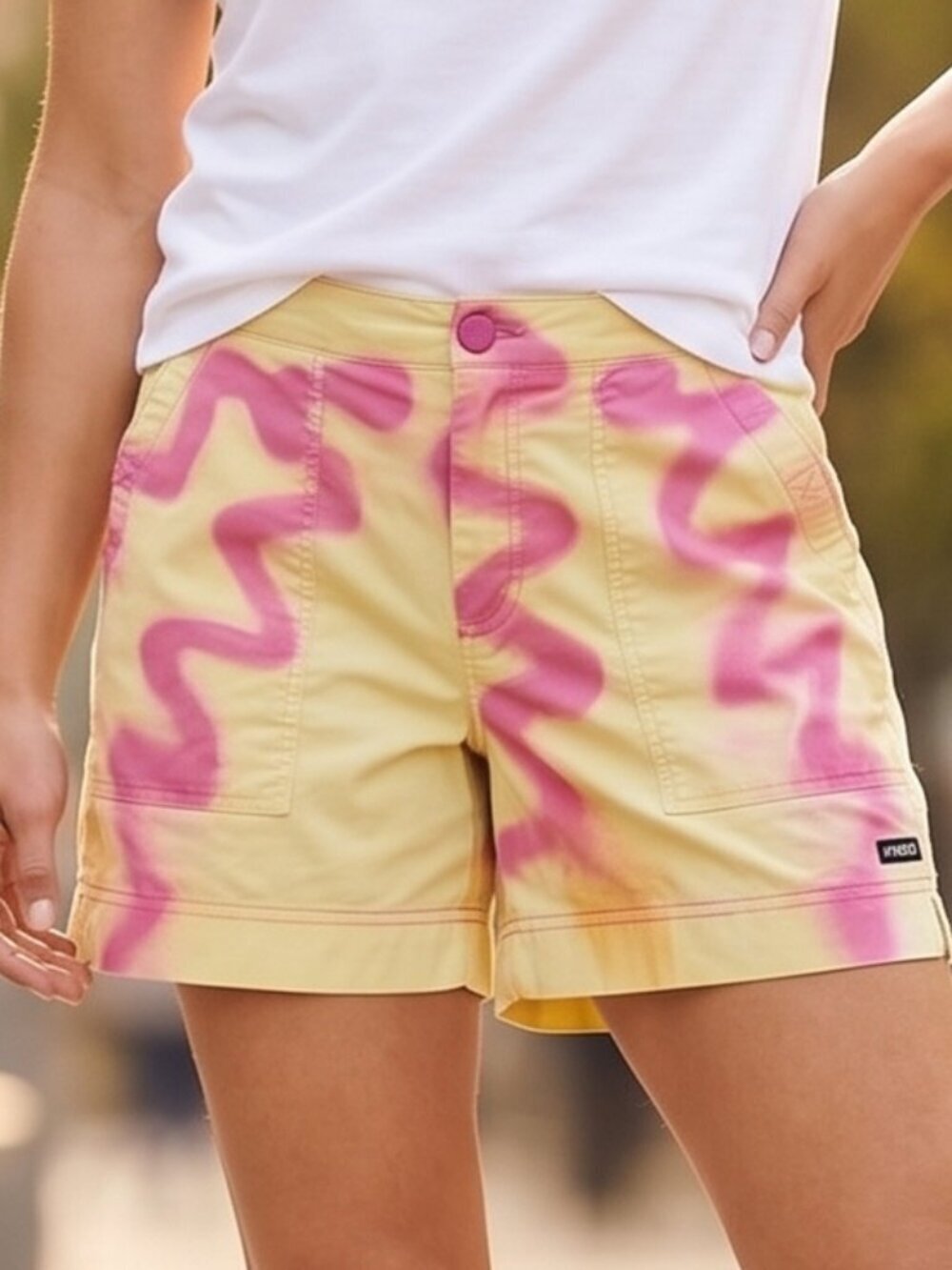 Athleta Shorts Size 10 EUC Yellow Golf Athletic Athleisure Pink Tennis Graffiti